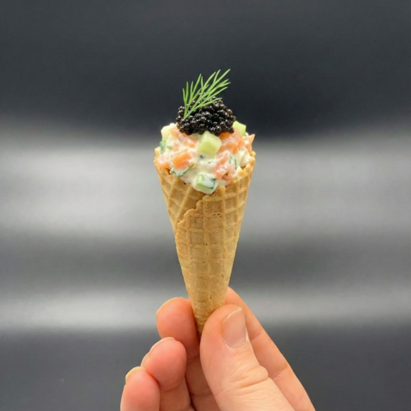 Mini Cone filled with lemon cream cheese, salmon, caviar and dill