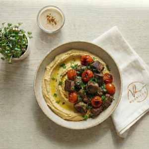 Ras El hanout hummus with spiced lamb salad